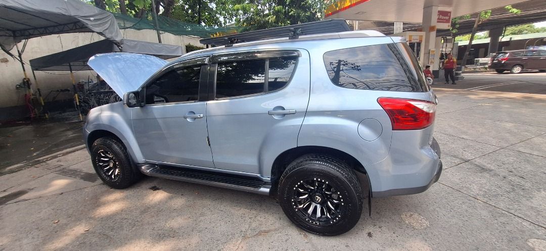 Isuzu Mu-X (Category: Used Cars) located in Caloocan City. Submitted by calmshark.c61944 (Listing ID 1463241317, Image 2). Description: Isuzu Mux LSM 4x2. M/T . Upgraded Rims and Tires. Well maintained. Not flooded. Cp# 09178204321.