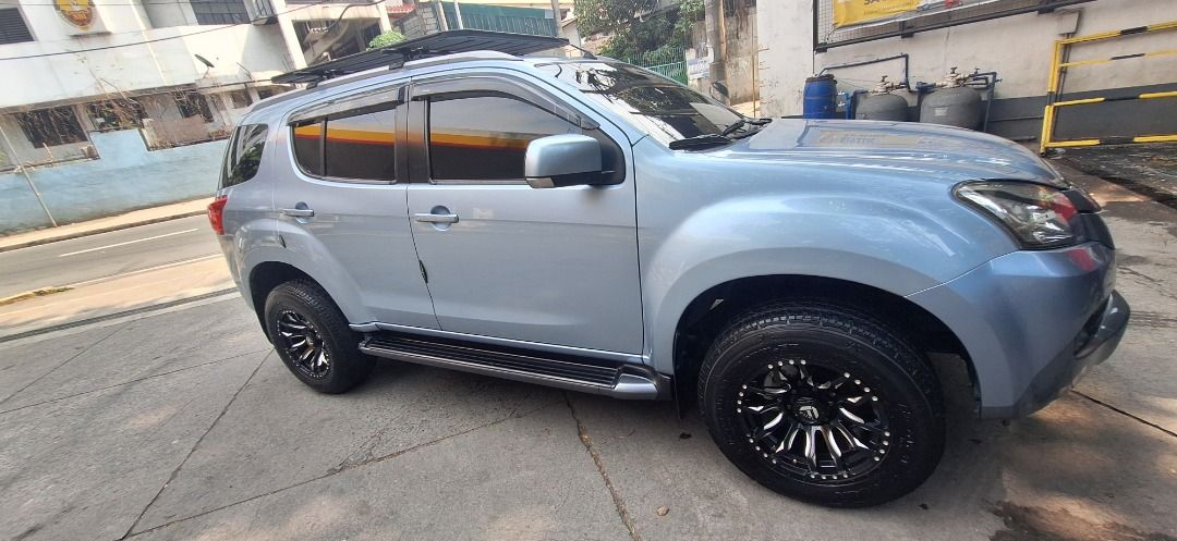 Isuzu Mu-X (Category: Used Cars) located in Caloocan City. Submitted by calmshark.c61944 (Listing ID 1463241317, Image 1). Description: Isuzu Mux LSM 4x2. M/T . Upgraded Rims and Tires. Well maintained. Not flooded. Cp# 09178204321.