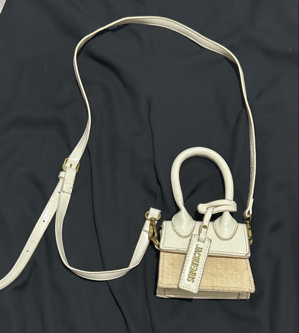 Jacquemus Le Chiquito Wicker & Leather Top-Handle Bag (Category: Luxury Bags & Wallets) located in Plaridel. Submitted by ilovebubu28 (Listing ID 1463236990, Image 2). Description: - Adorable mini bag - White leather top with straw woven base - Includes a long, adjustable strap - Features the iconic Jacquemus logo tag - Gold hardware details - Ideal for evening events or elevating your everyday look Not authentic . Pang porma lang .