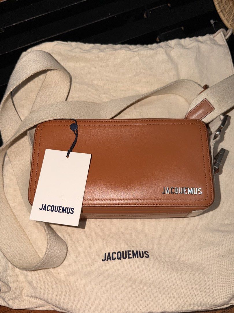 Jacquemus Le Cuerda Horizontal Bag Light Brown (Category: Luxury Bags & Wallets) located in Las Pinas. Submitted by twiceloved24 (Listing ID 1463260655, Image 1). Description: Decluttering some things that have been sitting pretty in my closet. 🤎 They deserve a new home! Jacquemus Le Cuerda Horizontal Yes, it’s technically a men’s design, but I absolutely love it. 😂 Seldom used - good as new. SPACIOUS! Bought for ₱49,500 Selling for ₱35,000 Com