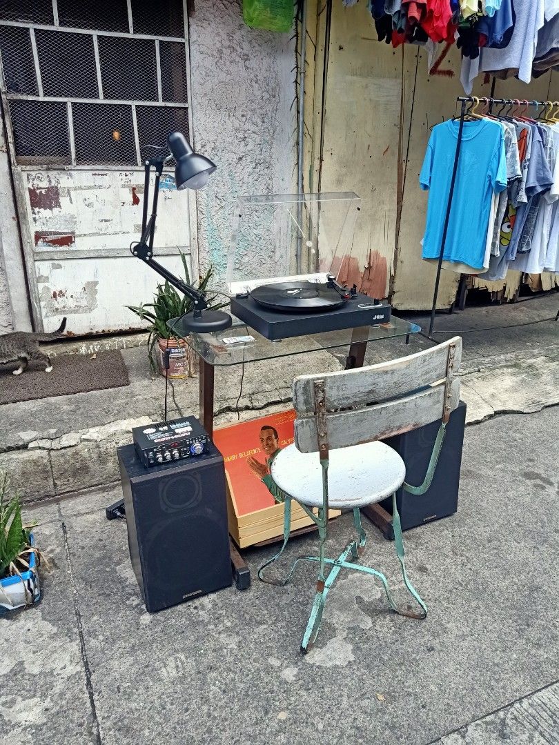 JAM TURNTABLE SET-UP WITH SPEAKERS (Category: Soundbars, Speakers & Amplifiers) located in Caloocan City. Submitted by ryanpaulpalomado12 (Listing ID 1463203057, Image 3). Description: +FOR SALE+ P9,500 TAKE ALL JAM TURNTABLE WITH 2WAY PIONEER SPEAKERS WITH AMPLIFIER AND LIGHT LAMP WITH STAND OLD MAKINA WITH TOP GLASS AND WOOD CHAIR WITH LAGAYAN NG PLAKA AT 3PCS PLAKA GAGAMITIN MO NALANG PO.. PWEDENG PWEDE SA MANCAVE MO.. LOCATION : BAGONG BARRIO