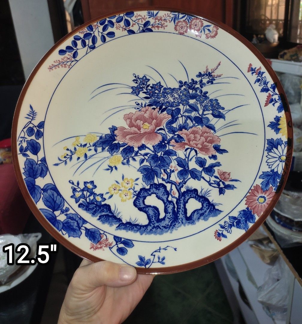 Japanese Style Ceramic Dinnerware Set - Take All 1,200 (Category: Dinnerware & Cutlery) located in Manila. Submitted by margeventa (Listing ID 1463230116, Image 3). Description: - Authentic Japanese-style ceramic dinnerware set. - Includes: 1 large 12.5" serving plate (brown lining, floral deco), 3 small bowls (6" x 1.8" deep, floral patterns), 1 decorative lidded bowl, 1 square dish. - Comes with chopsticks. - Ideal for serving meals or as a dec