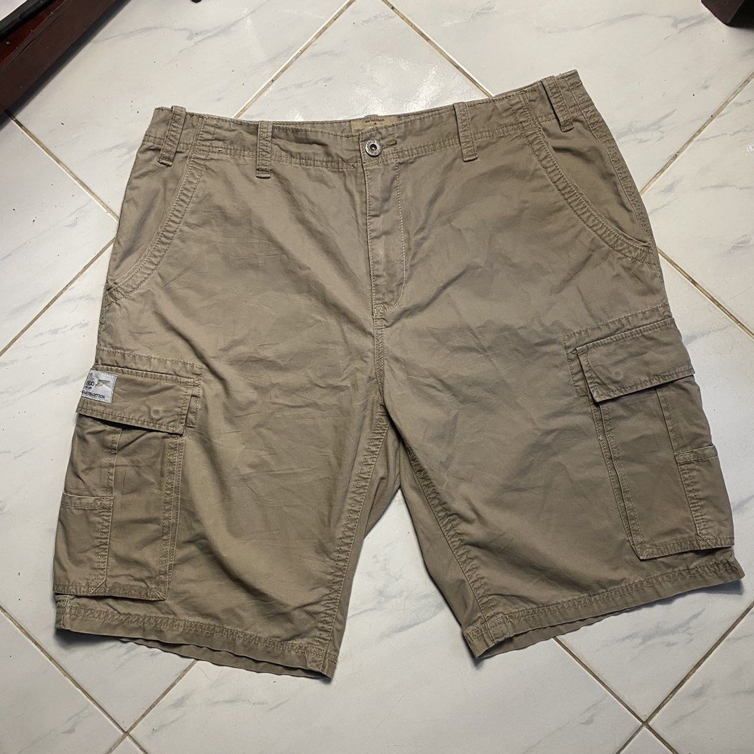 JNCO Authentic Cargo Shorts Khaki (Category: Shorts) located in Camiling. Submitted by camthrift_2024 (Listing ID 1463167038, Image 2). Description: JNCO CARGO KHAKI WAIST: 40 THIGH: 13.5 LENGHT: 23.5 LEG OPENING/HEM: 13 COLOR RATE: 9/10 ISSUE:❌❌❌ 450₱ SHIP NOW OPEN FOR TERMS UNLI VOUCH GCASH JNT CAMILING, TARLAC📌 - Authentic JNCO khaki cargo shorts - Multiple functional pockets - Secure button and zip closure - Ideal for casual and everyday wea