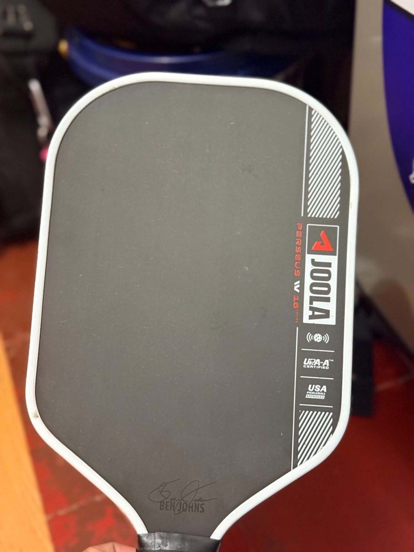 JOOLA Perseus CFS 16mm Pickleball Paddle Ben Johns (Category: Racket and Ball Sports) located in Makati City. Submitted by hizuka_hunterxhunter (Listing ID 1463186726, Image 3). Description: - JOOLA Perseus CFS 16mm Pickleball Paddle - Ben Johns Edition - USA Approved - Features TFP Technology for excellent control and power - Made in China - Shows some signs of use on the surface.