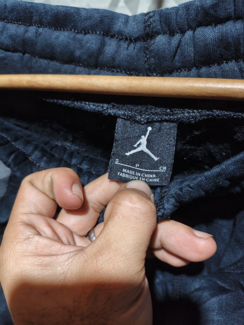 Jordan 14 Sweatpants Joggers Size S (Category: Joggers) located in Maasim. Submitted by ukayganda25 (Listing ID 1463299429, Image 3). Description: - Jordan sweatpants - Color: Dark Blue and Grey - Size: S - Features: Elastic waistband with drawstring, Jordan Jumpman logo on left leg - Origin: Made in China - Ideal for: Casual wear or sports.