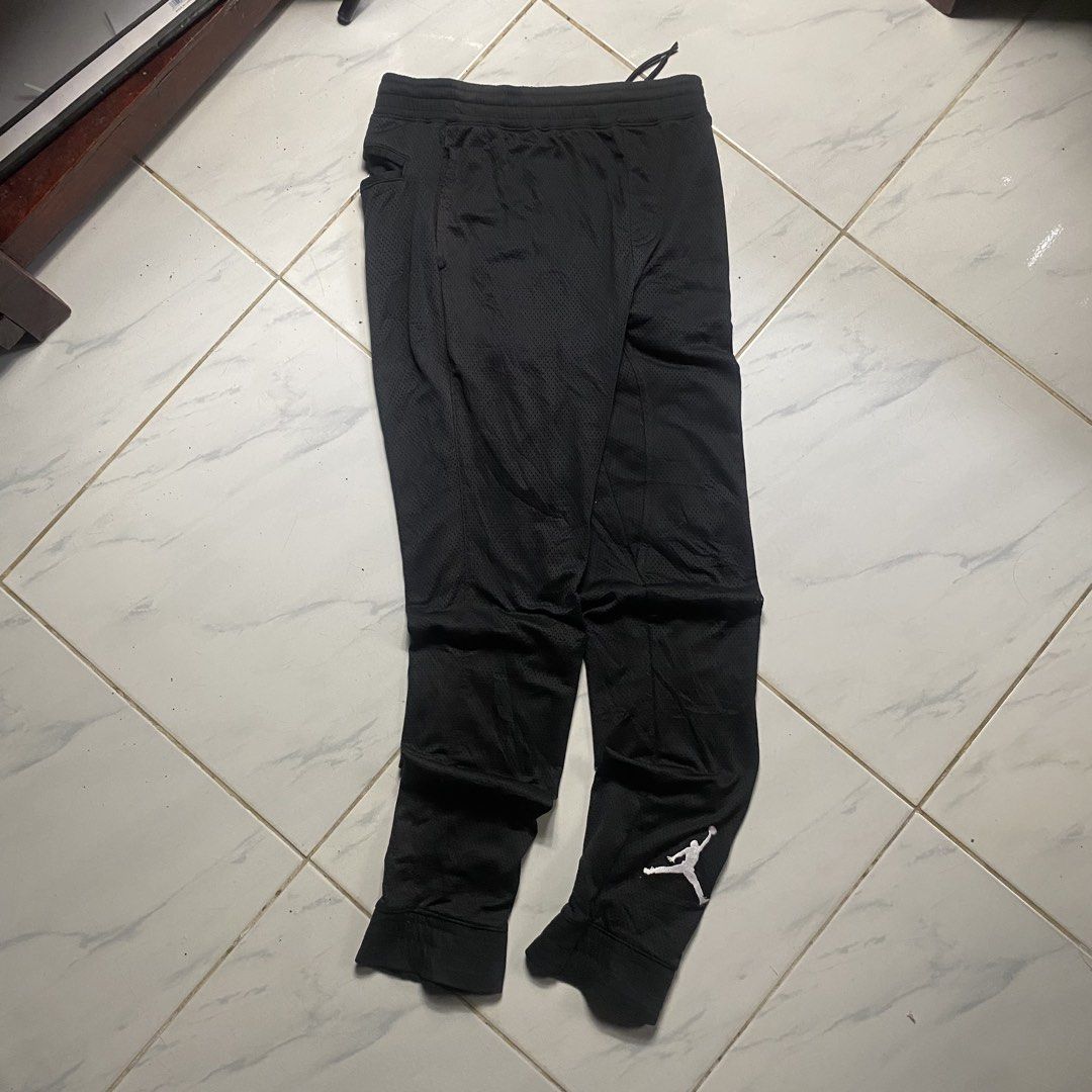Jordan Black Mesh Jogger Pants (Category: Joggers) located in Camiling. Submitted by camthrift_2024 (Listing ID 1463168498, Image 1). Description: JORDAN DRI-FIT JOGGER WAIST: 27-34 (WITH LACE) (SMALL) THIGH: 9 LENGHT:38 COLOR RATE: 10/10 ISSUE:❌❌❌ 300₱ SHIP NOW OPEN FOR TERMS UNLI VOUCH GCASH JNT CAMILING, TARLAC📌 - Black Jordan track pants - Mesh material - Size XL (fits 158-170cm or 13-15 years) - Made in Indonesia - Elastic waistband with dr