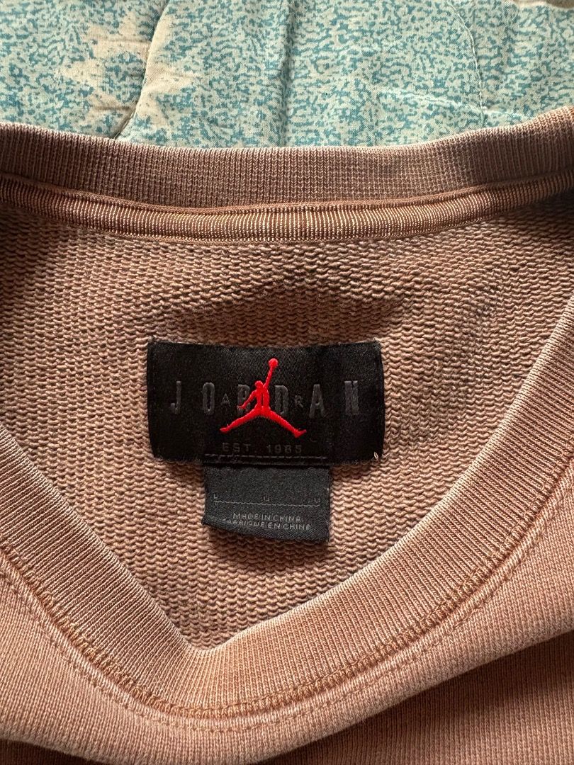 Jordan Flight Crewneck Sweatshirt (Category: Coats, Jackets and Outerwear) located in Caloocan City. Submitted by ssshhhaae (Listing ID 1463130917, Image 3). Description: - Brown Jordan crewneck sweatshirt - Features the iconic Jordan Flight logo patch on the lower right side - Made from a soft and comfortable fabric - Perfect for casual and everyday wear.