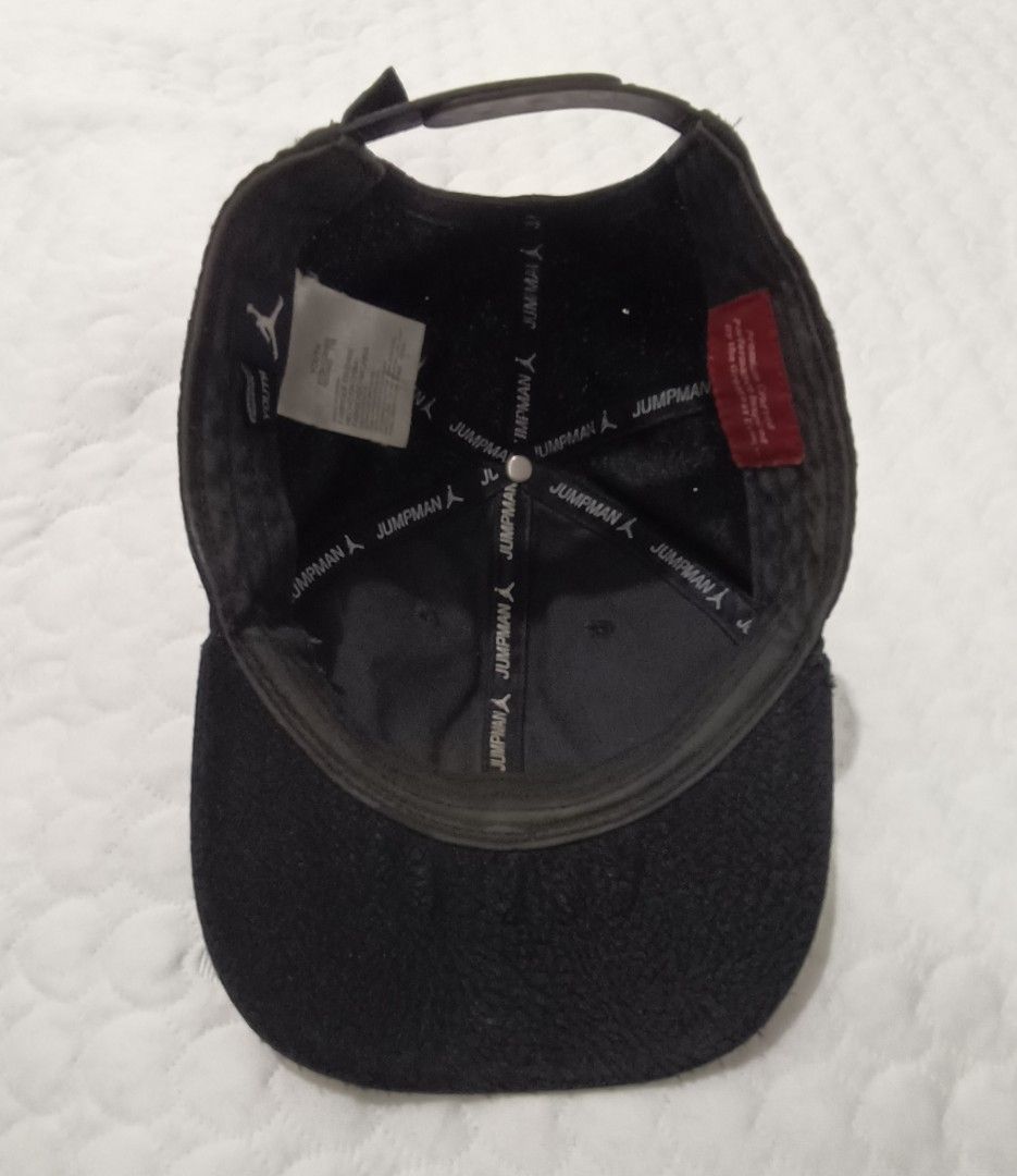 Jordan Jumpman Snapback Cap Black Elephant Skin (Category: Caps & Hats) located in Pasig City. Submitted by joaquin_1207 (Listing ID 1463281068, Image 3). Description: - Black Jordan snapback cap - Features iconic Jumpman logo on the front - Textured material for a premium feel - Adjustable strap at the back for a customized fit - Ideal for any fan of Michael Jordan and the Jordan brand.