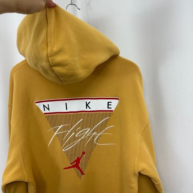 Jordan Nike Flight Yellow Hoodie (Category: Coats, Jackets and Outerwear) located in Bulacan. Submitted by adrian2325 (Listing ID 1463244301, Image 3). Description: - Yellow Jordan hoodie - Nike Flight graphic on back - Jumpman logo on chest - Classic hoodie design with front pocket - Drawstring hood - Perfect for casual wear.