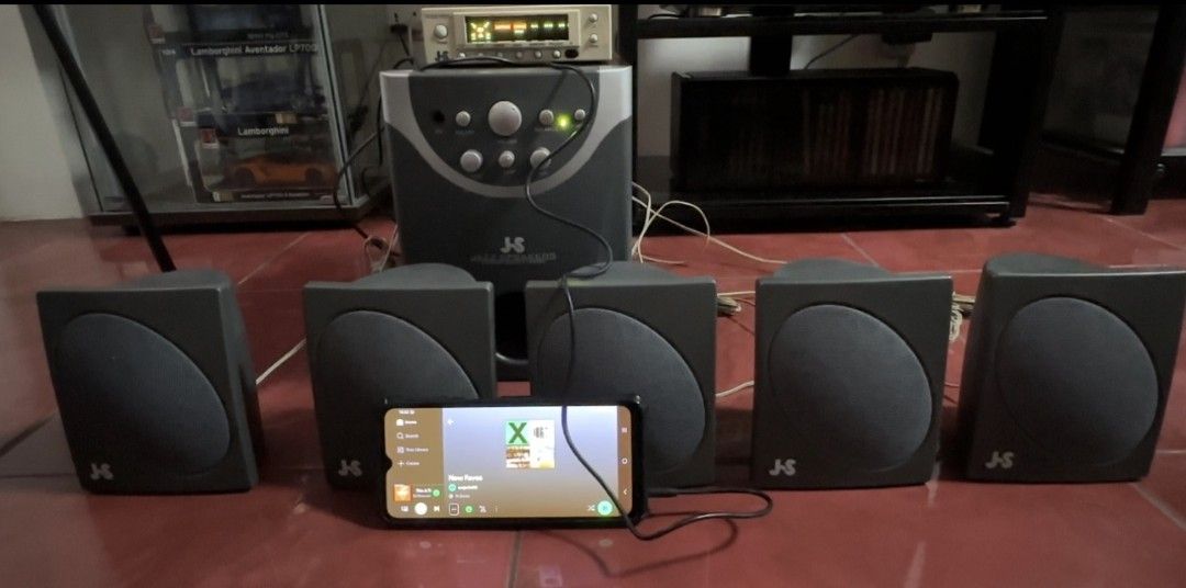 JS 5.1 Channel Speaker System with Subwoofer (Category: Soundbars, Speakers & Amplifiers) located in Imus. Submitted by snapandsketch (Listing ID 1463184454, Image 2). Description: - JS 5.1 Channel Speaker System - Includes 1 Subwoofer and 5 Satellite Speakers - Elevate your audio experience - Easy connectivity to your devices - Tested and confirmed working - Minor cosmetic scuffs on the subwoofer - Satellite speakers are in clean condition.