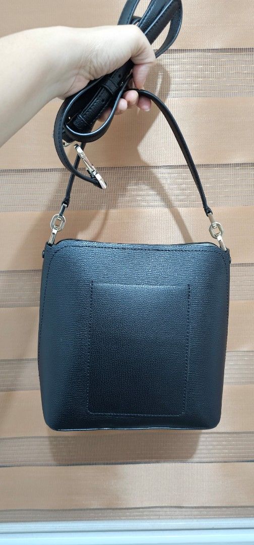 Kate Spade Darcy Small Bucket Bag (Category: Cross-body Bags) located in San Fernando. Submitted by adiwa (Listing ID 1463303335, Image 2). Description: - Authentic Kate Spade bucket bag - Silver hardware - Adjustable strap for comfortable wear - Meticulously cleaned, inside and out - Ideal for everyday use and errands - Minimal scratch see photos.