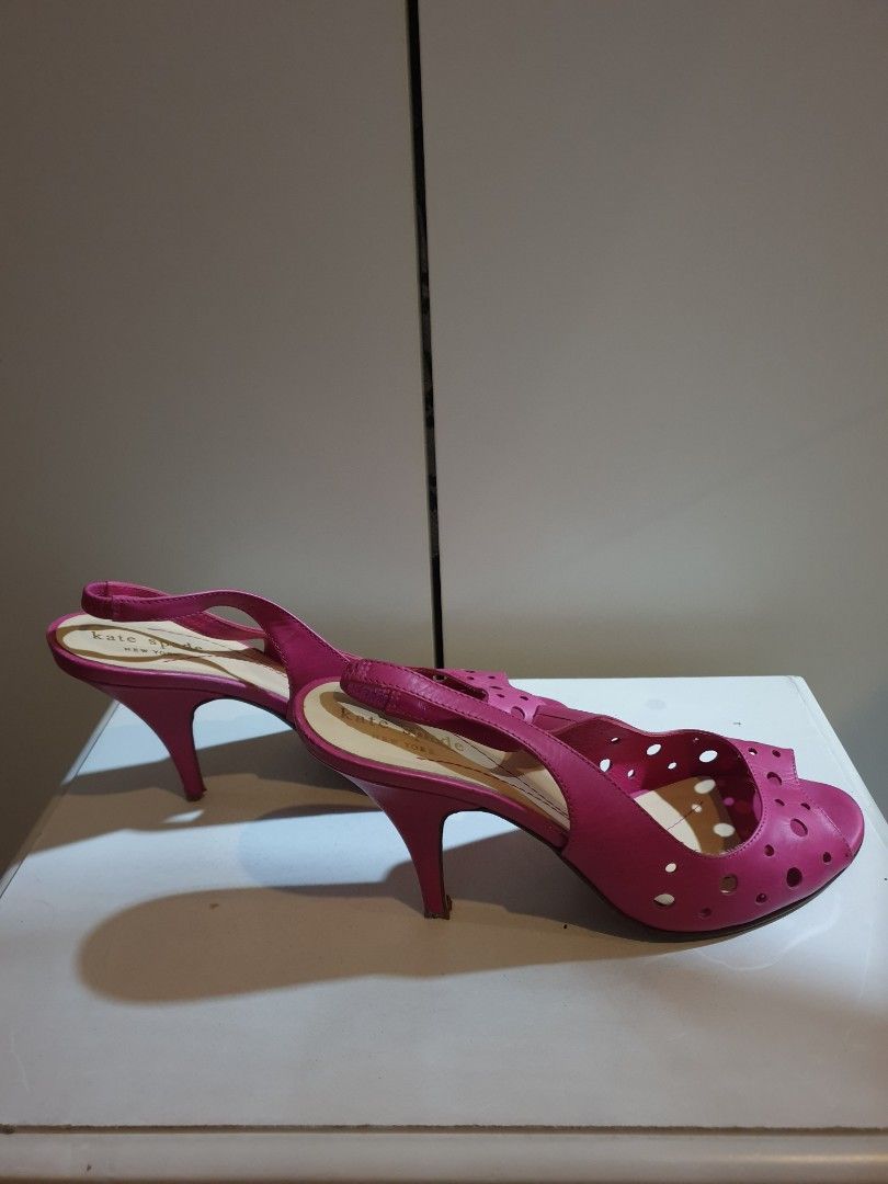 Kate Spade Pink Peep-Toe Slingback Heels (Category: Heels) located in San Juan City. Submitted by parrishop (Listing ID 1463250211, Image 3). Description: - Brand: Kate Spade - Style: Peep-toe slingback heels - Color: Pink - Design: All-over perforated pattern - Heel: Comfortable height - Occasion: Dress up or down, perfect for summer.