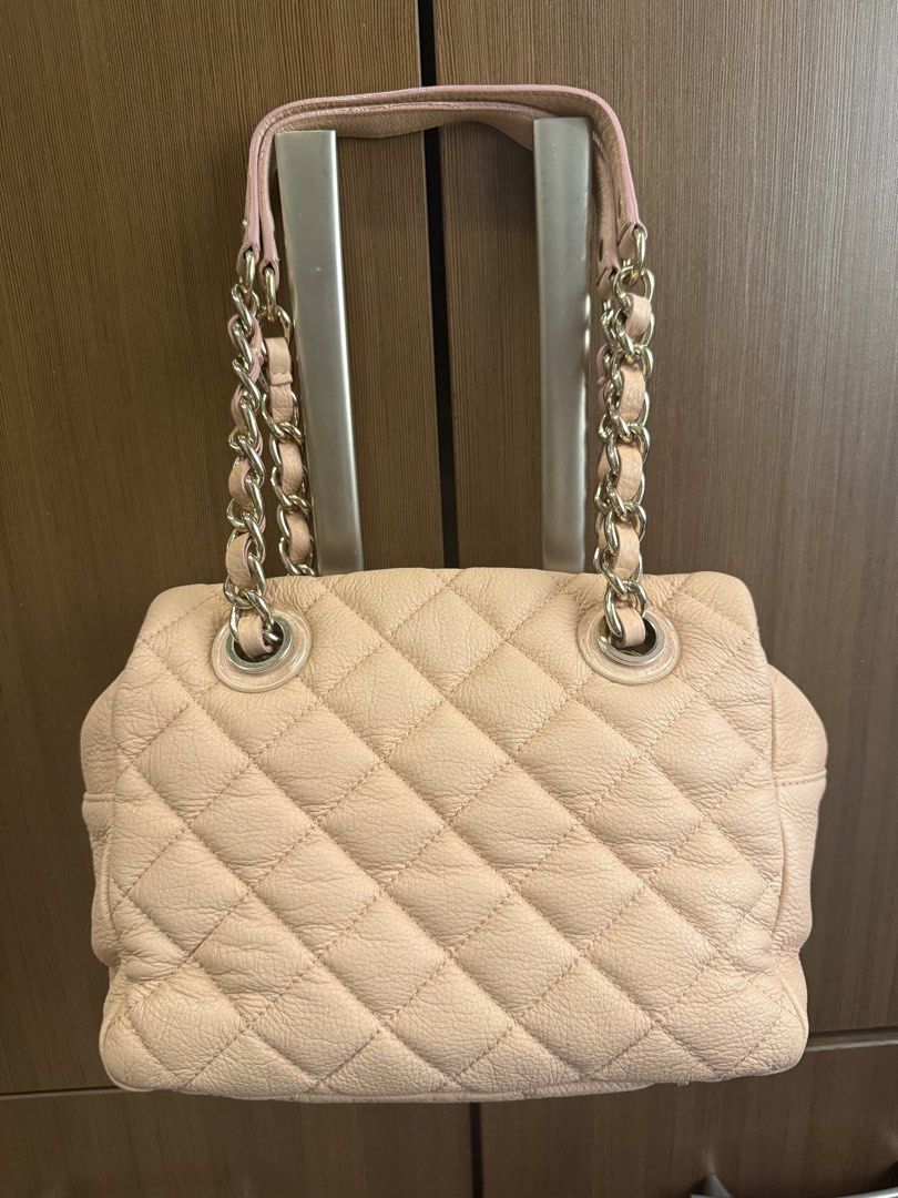 Kate Spade Pink Quilted Leather Shoulder Bag (Category: Luxury Bags & Wallets) located in Taguig. Submitted by migraineur (Listing ID 1463164867, Image 3). Description: - Brand: Kate Spade New York - Color: Light Pink - Material: Quilted Leather - Style: Shoulder Bag - Features: Chain strap, top handle, zipper closure - Condition: Very light corner wear - Ideal for: Everyday use Size: Medium Sized and Roomy Width 27cm Height 20cm Depth 14cm.