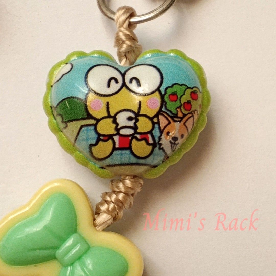 Kerokerokeroppi Acrylic Charm Keychain (Category: Charms) located in Taguig. Submitted by mimisrack (Listing ID 1463322713, Image 3). Description: 💚Cute Kerokerokeroppi acrylic charm with a playful green-and-mint color theme! ✨ -Featuring Keroppi designs, a sweet mint-green bow, braided cord, and translucent green accent beads. -Perfect for your keys, bag, pouch, wallet, or backpack! 🐸💚 -A fun little accessory for Sanrio & Kerokerokeroppi fans