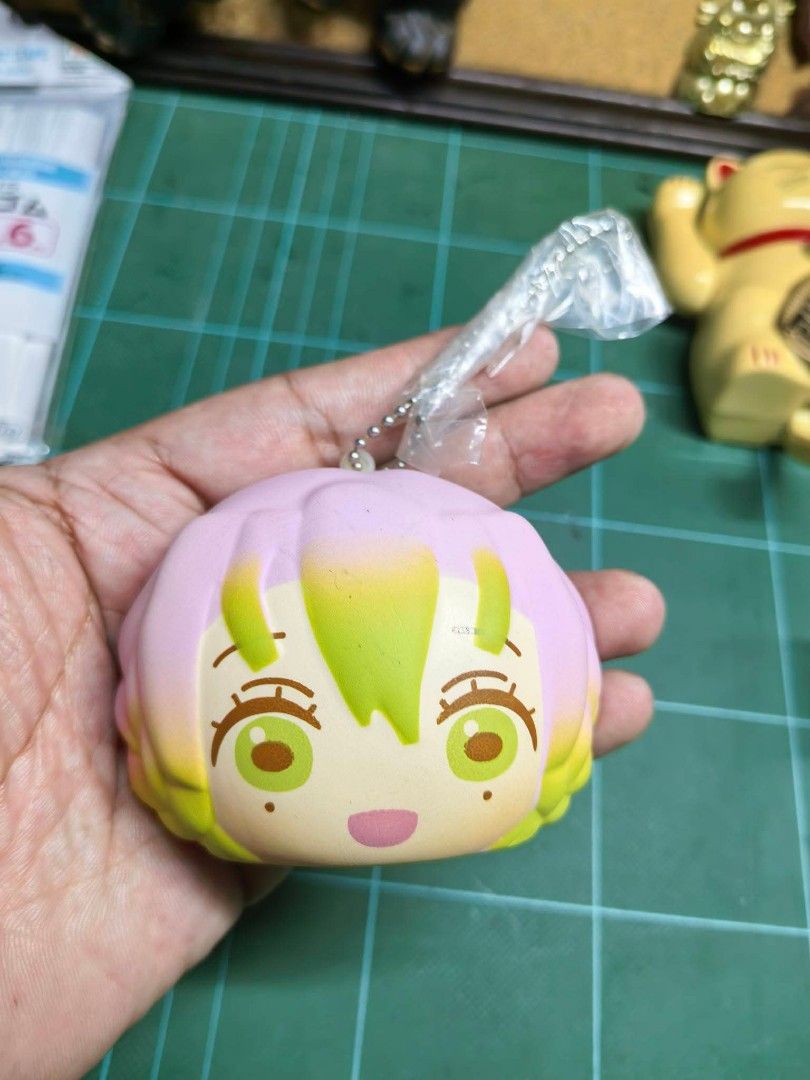 Keychain - MegaHouse Demon Slayer Squishy Keychain (Category: Charms) located in Cebu City. Submitted by dudes_villanueva (Listing ID 1463134645, Image 1). Description: Keychain - MegaHouse Demon Slayer: Kimetsu no Yaiba "Fuka Fuka Squeeze Pan" Squishy Keychain 📌 Featuring the character Mitsuri Kanroji with her signature pink and green hair. 📌 In excellent condition..