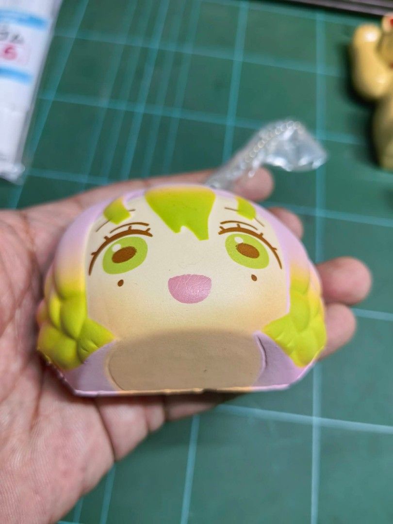 Keychain - MegaHouse Demon Slayer Squishy Keychain (Category: Charms) located in Cebu City. Submitted by dudes_villanueva (Listing ID 1463134645, Image 2). Description: Keychain - MegaHouse Demon Slayer: Kimetsu no Yaiba "Fuka Fuka Squeeze Pan" Squishy Keychain 📌 Featuring the character Mitsuri Kanroji with her signature pink and green hair. 📌 In excellent condition..
