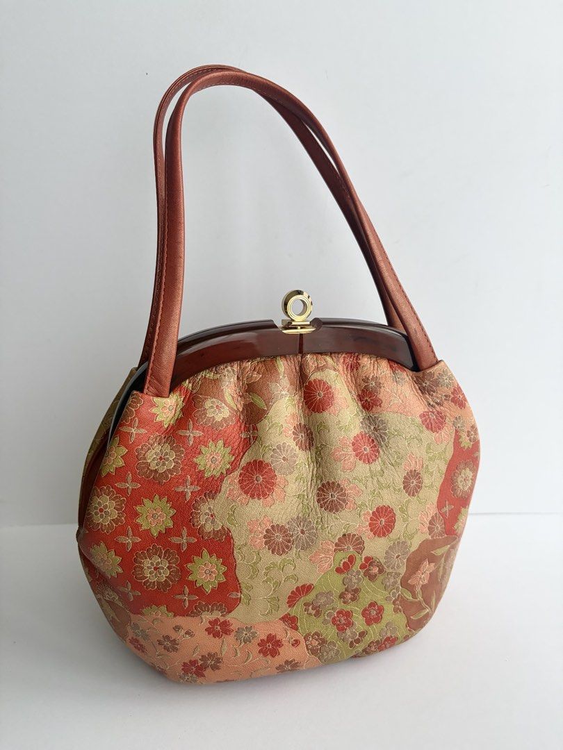 Kimono Kisslock Handbag (Category: Purses & Pouches) located in Quezon City. Submitted by wagwagan_ukay_blues (Listing ID 1463221976, Image 1). Description: From Japan In good condition L-6” W-3” H-7”.