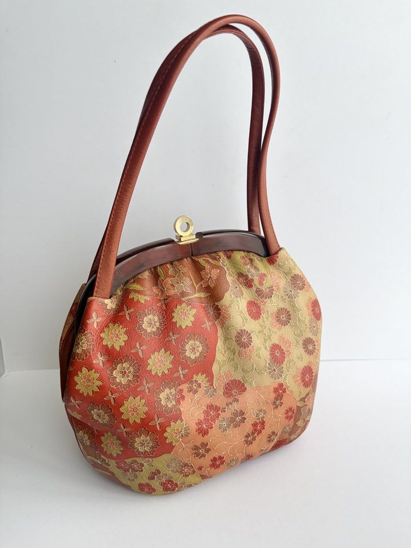 Kimono Kisslock Handbag (Category: Purses & Pouches) located in Quezon City. Submitted by wagwagan_ukay_blues (Listing ID 1463221976, Image 2). Description: From Japan In good condition L-6” W-3” H-7”.