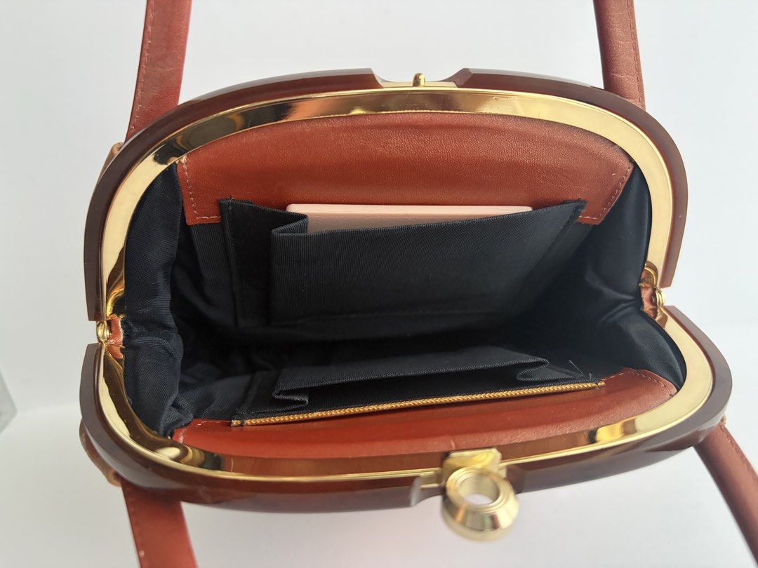 Kimono Kisslock Handbag (Category: Purses & Pouches) located in Quezon City. Submitted by wagwagan_ukay_blues (Listing ID 1463221976, Image 3). Description: From Japan In good condition L-6” W-3” H-7”.