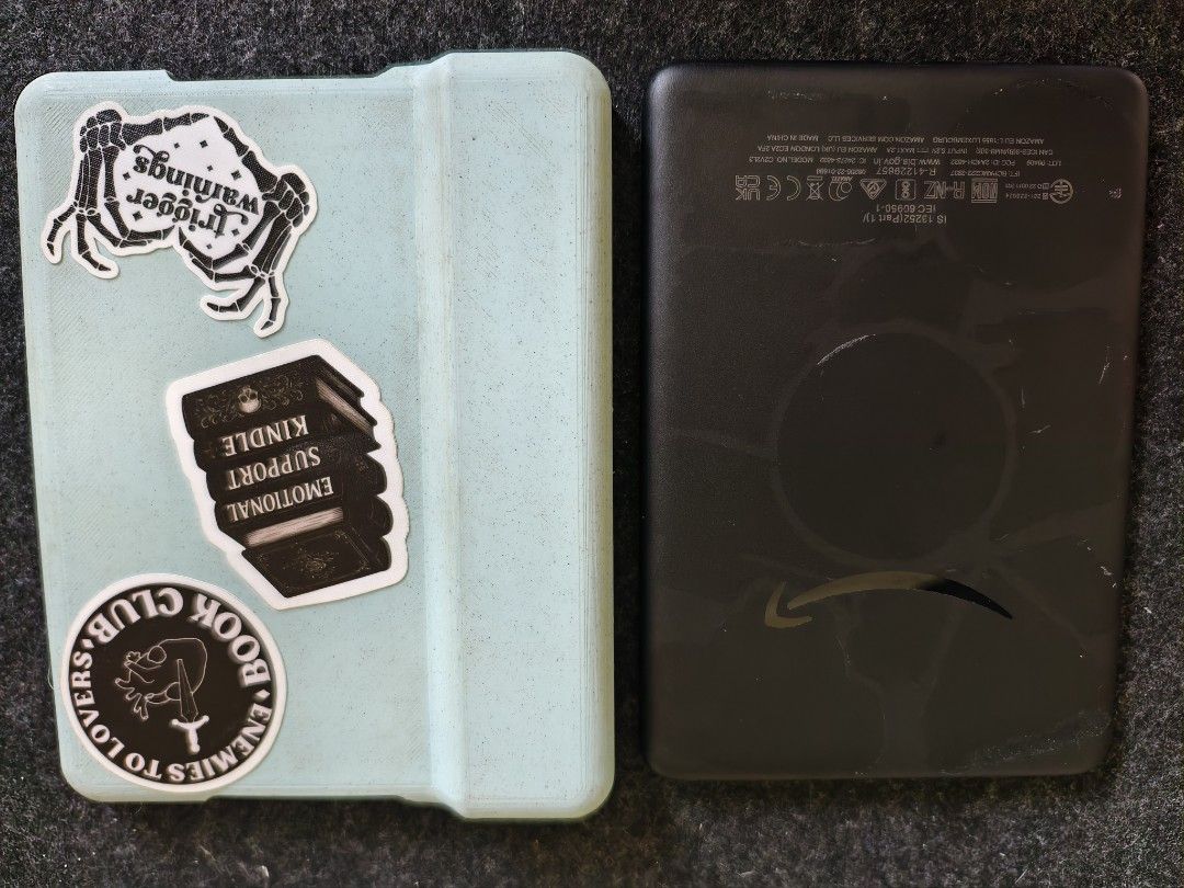 Kindle Basic 2022 ed. (Category: E-Readers) located in Naga. Submitted by mjlim10_ (Listing ID 1463144290, Image 3). Description: *Sticker marks on back. *Very minimal scratch on back. *With skin + screen protector. *With Ads ***no issues / can register amazon account rfs: barely used. .