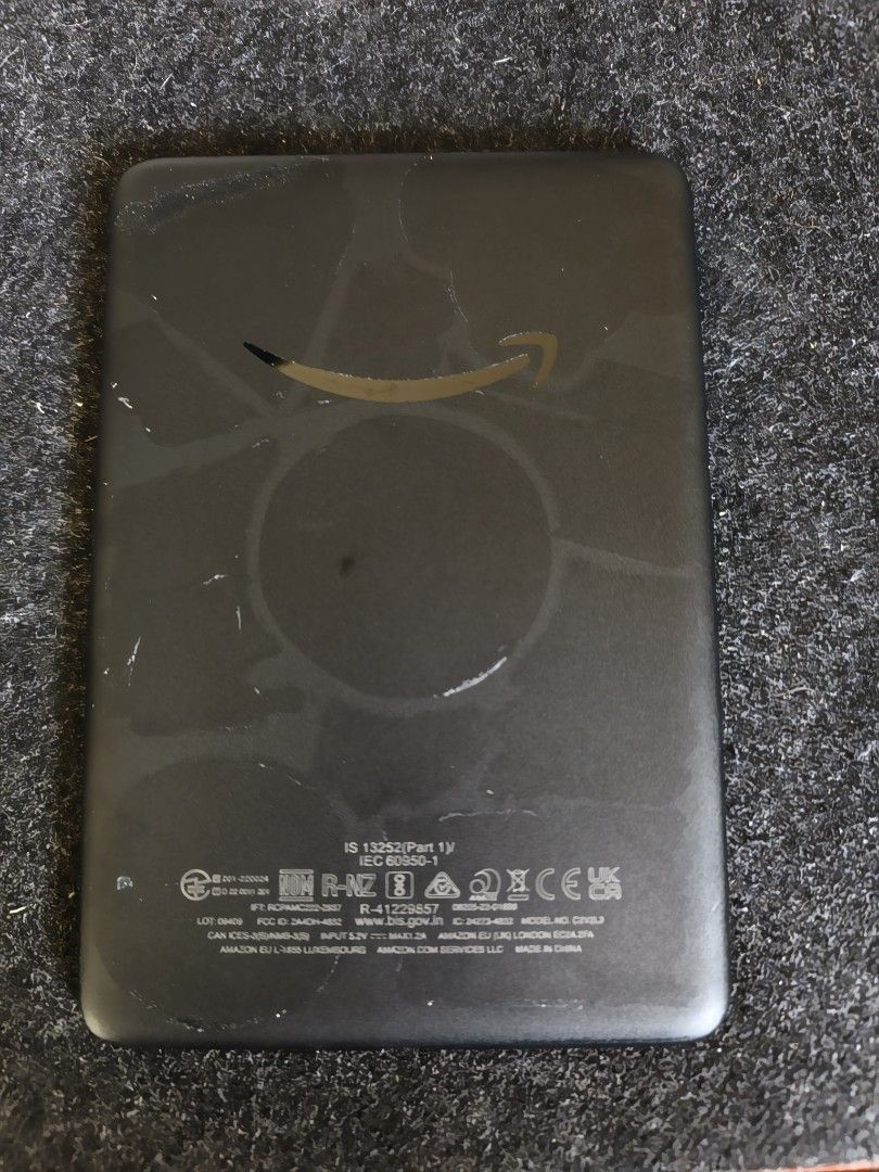 Kindle Basic 2022 ed. (Category: E-Readers) located in Naga. Submitted by mjlim10_ (Listing ID 1463144290, Image 2). Description: *Sticker marks on back. *Very minimal scratch on back. *With skin + screen protector. *With Ads ***no issues / can register amazon account rfs: barely used. .