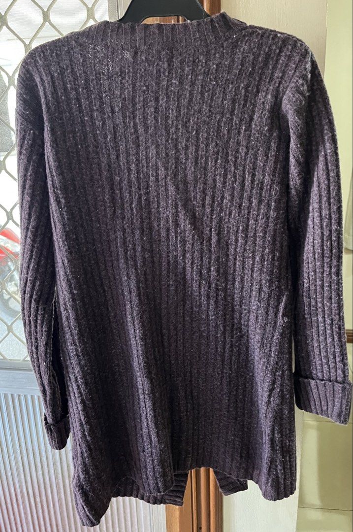 Knitted long sleeves (Category: Others Tops) located in Bacoor. Submitted by ayit. (Listing ID 1463163864, Image 2). Description: Orig personal japan gling Med-large fit - Knitted long sleeves cardigan - Color: Dark purple/plum - Size: Medium (M) - Design: V-neck, button-down closure, two front pockets - Texture: Ribbed knit.