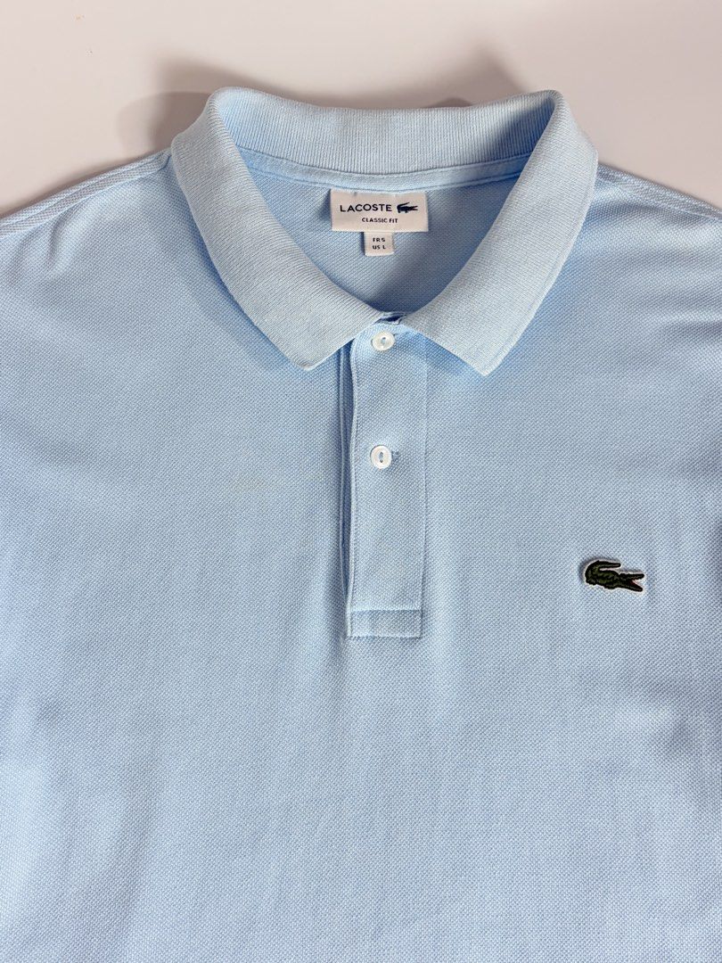 Lacoste (Category: Formal Shirts) located in Manila. Submitted by vinthreads (Listing ID 1463174487, Image 3). Description: Authentic L4C0ST. Size: M men’s (Based on measurements) Width: 21/ Length: 27 Excellent condition Color rate: 9.8/10 Color way: light blue Issue: ______________________________________ 📌Note: Color may vary due to lighting..