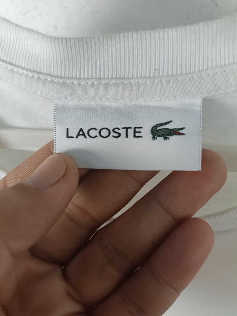 Lacoste (Category: Luxury Apparel) located in Bacolod City. Submitted by freelion-1cc5 (Listing ID 1463323825, Image 3). Description: dimes:22x28.5 color rate:9.5/10 no issue asnew condition.