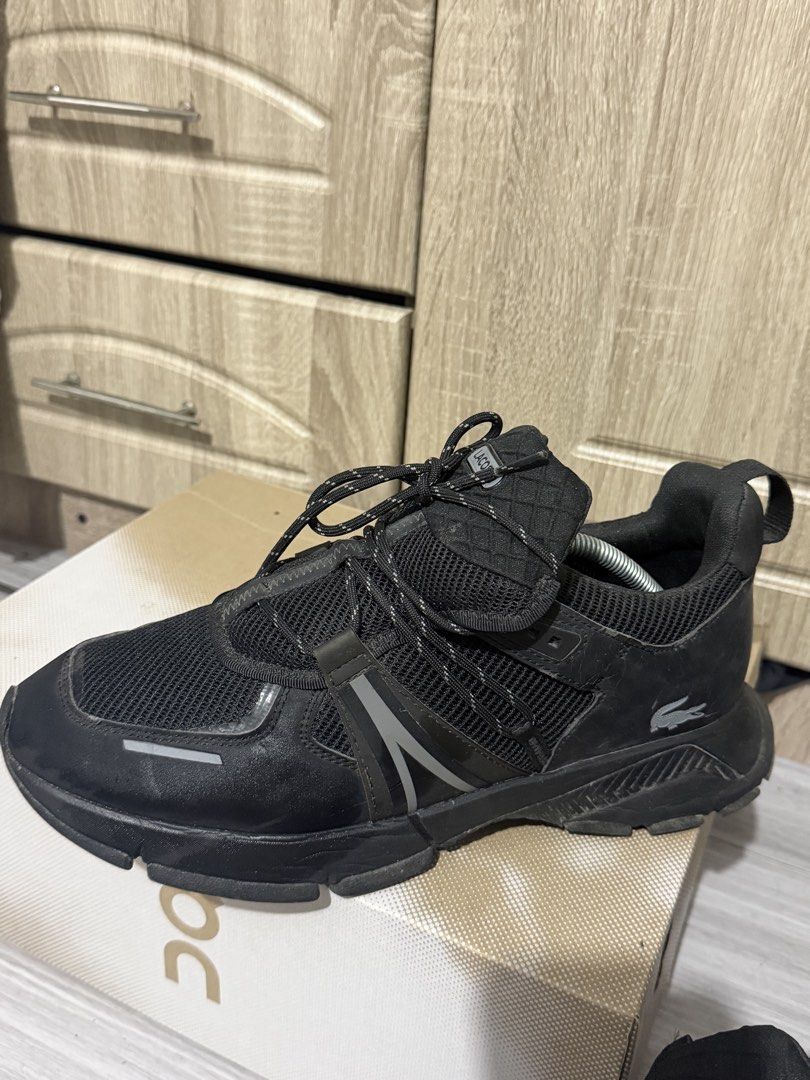 Lacoste Black Sneakers (Category: Sneakers) located in Manila. Submitted by marlboxspace (Listing ID 1463304422, Image 2). Description: - Authentic Black Lacoste Sneakers - Secure Lace-Up Closure - Durable Sole with Signature Lacoste Branding - Perfect for Everyday Wear - Please check photos for detailed condition Used few times nasa storage lang may buka ng onti pwede ipatahi all goods na selling low bought this for 8500.