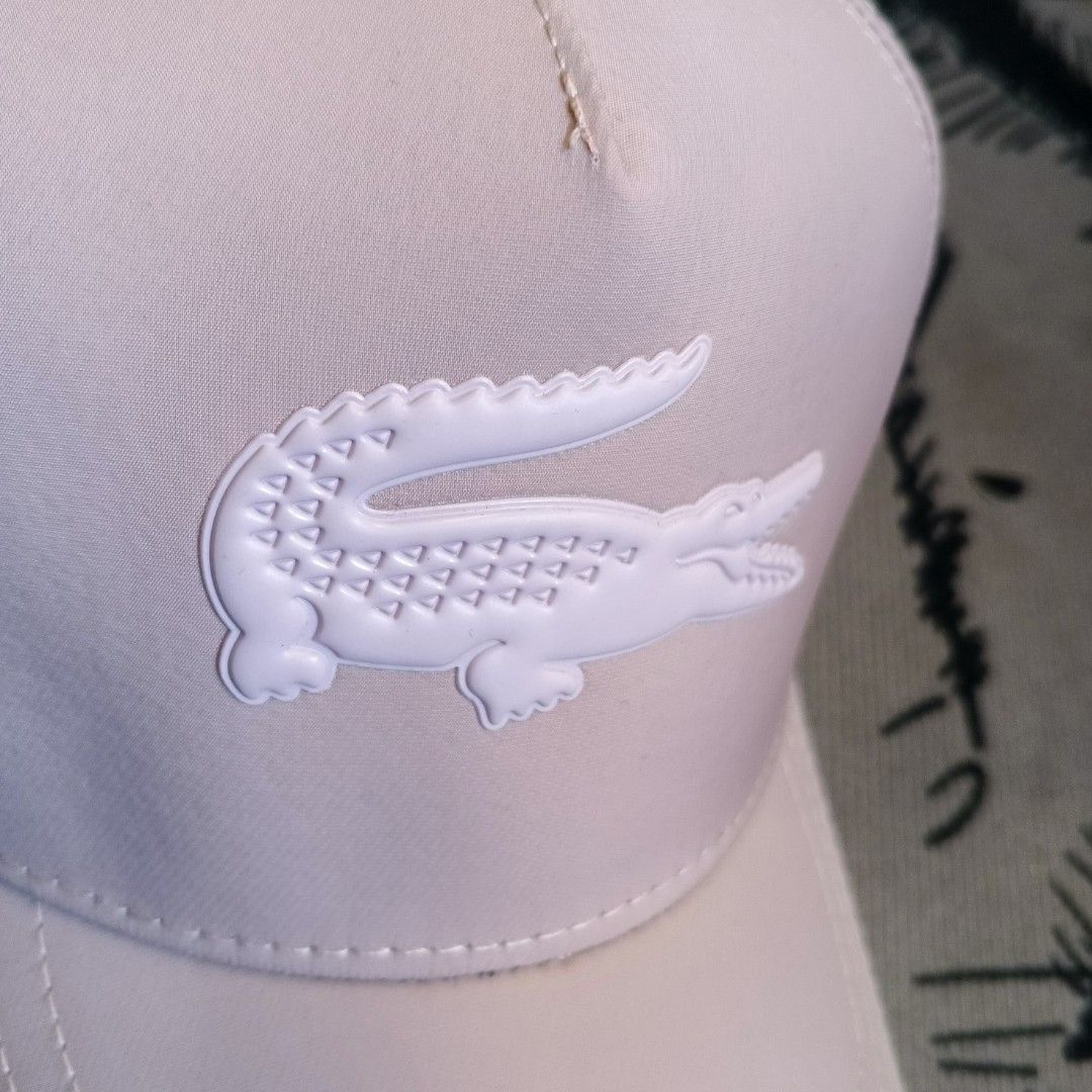 Lacoste cap (Category: Caps & Hats) located in Manila. Submitted by janna_m (Listing ID 1463310026, Image 2). Description: EXCELLENT CONDITION ✅ NO ISSUES ✅ DM FOR INQUIRIES 📩.