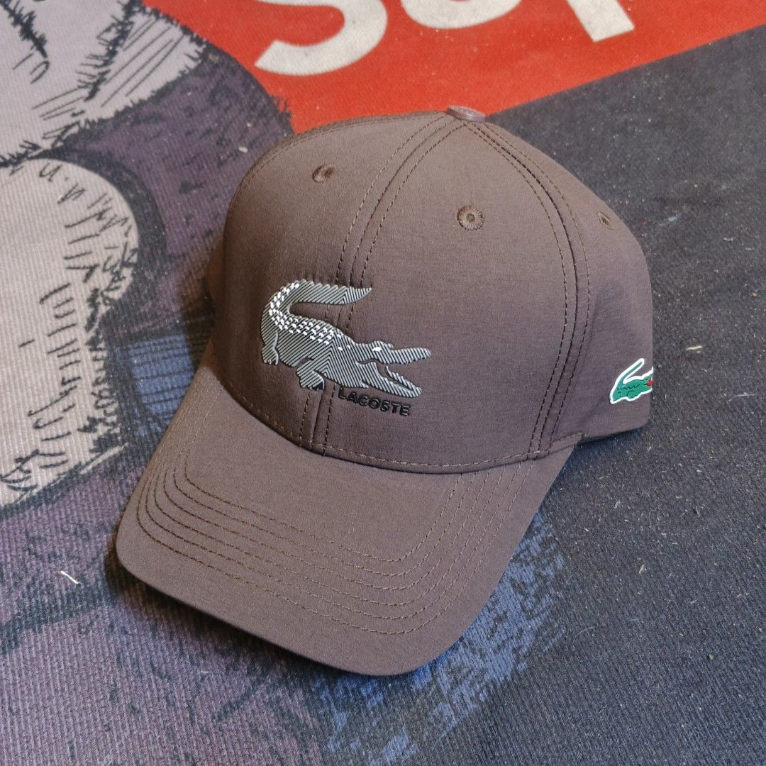 Lacoste cap (Category: Caps & Hats) located in Manila. Submitted by janna_m (Listing ID 1463320557, Image 1). Description: EXCELLENT CONDITION ✅ NO ISSUES ✅ DM FOR INQUIRIES 📩.
