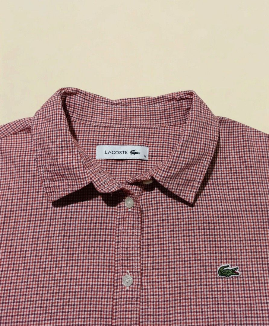 Lacoste Gingham Button-Up Shirt (Category: Longsleeves) located in Marikina City. Submitted by oldfits14 (Listing ID 1463264980, Image 2). Description: LACOSTE POLO LONG SLEEVE BUTTON DOWN FOR WOMEN'S - 100% Legit/Authentic - Size 38 ▫️Color may vary due to lighting ▫️Dimes: 20.5 X 26 ▫️Color rate: 10/10 ▫️As New Condition ▫️No Issue ▫️Already washed .