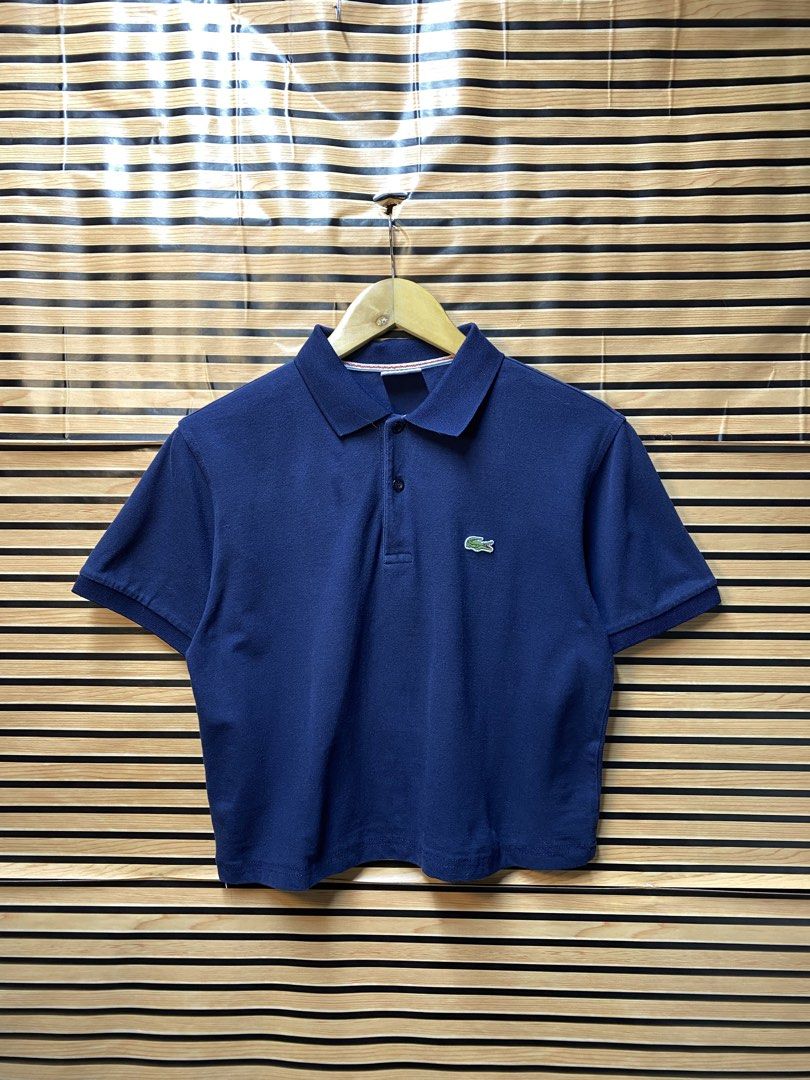 LACOSTE POLO SHIRT (CROP) (Category: Shirts) located in Makati City. Submitted by drip.poww (Listing ID 1463290862, Image 1). Description: - Authentic Lacoste - Color: Navy blue - Size: Small - Dimes: 19x20 - Authentic - Excellent condition - Need wash, fresh from bale - Material: 100% Cotton Please don’t expect too much—these are thrifted (ukay) items. 😊 !!STILL NEGOTIABLE!!.