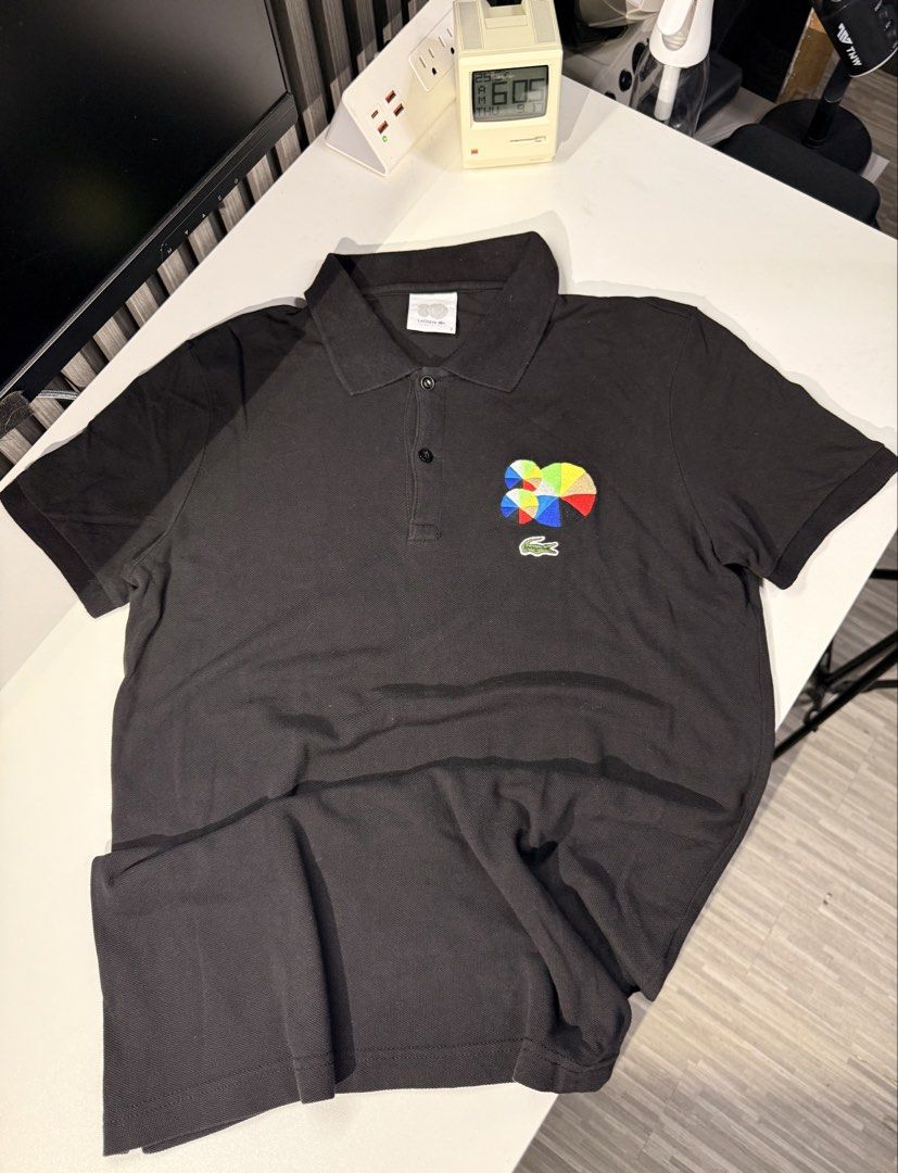 Lacoste Poloshirt (Category: Activewear) located in Bulacan. Submitted by jomar_0705 (Listing ID 1463186551, Image 2). Description: Lacoste PoloShirt Size 3 W20 L27 As new No issue.