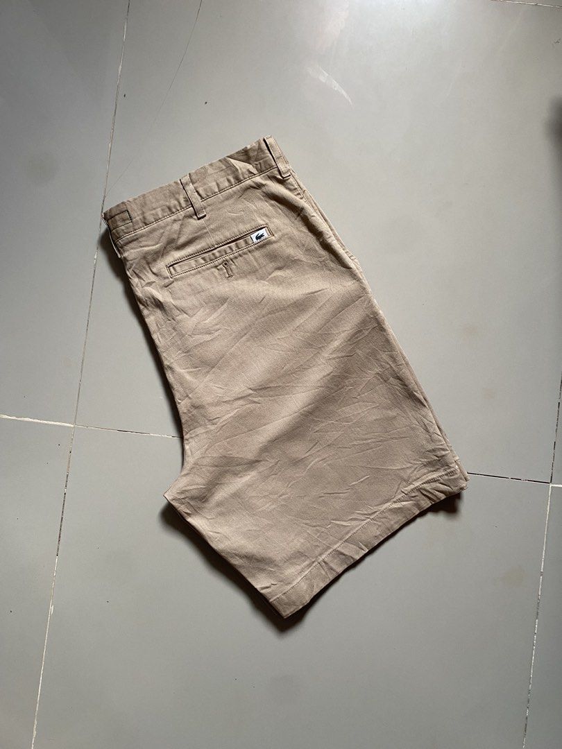 Lacoste Regular Fit Stretch (Category: Chinos) located in Minglanilla. Submitted by b.a.thefinds (Listing ID 1463175724, Image 3). Description: 🔱Authentic Lacoste Regular Fit Stretch Organic Cotton Chino Short🔱 Color: Beige / Viennese - excellent condition - good as new - flawless - C.R. 10/10 - crispy condition - original/authentic 💯 W - 36-37 L - 19.5 T - 13 H - 12 💰Php + SF 💰.