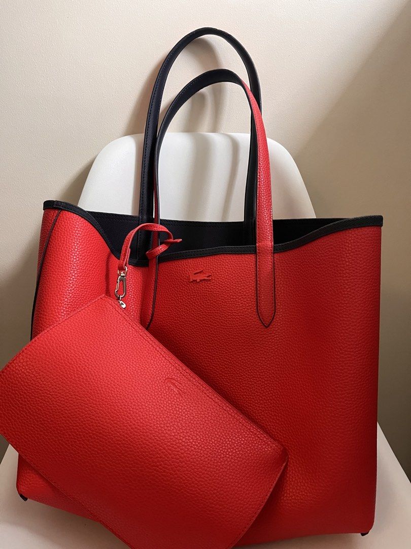 Lacoste Reversable Anna Tote Tennis (Category: Clutches) located in Manila. Submitted by hannaming (Listing ID 1463192007, Image 3). Description: Slightly Used. Planning to buy bag with zipper :) With dust bag.