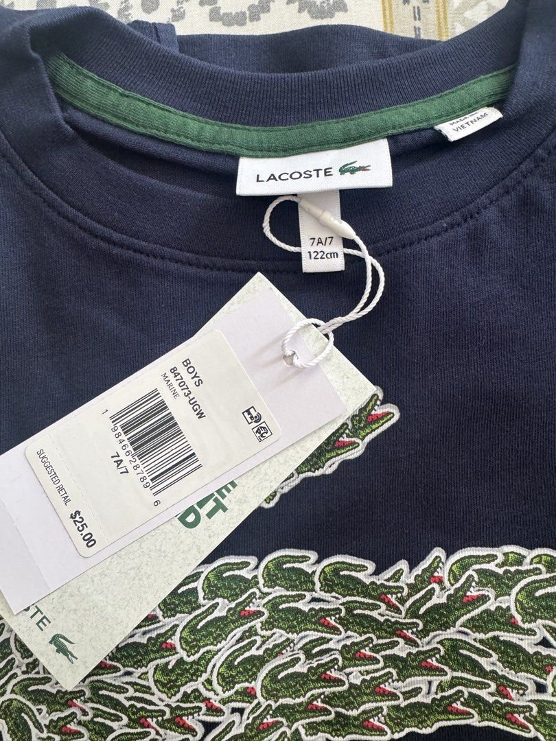 Lacoste Shirt 7t (Category: Babies & Kids Fashion) located in Cordova. Submitted by mdarylshay84786 (Listing ID 1463162553, Image 2). Description: .