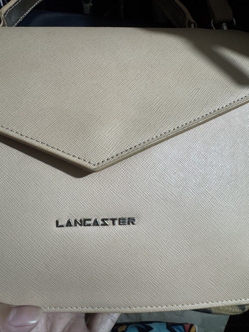 LANCASTER PARIS (Category: Cross-body Bags) located in Quezon City. Submitted by angel12171984 (Listing ID 1463283727, Image 2). Description: Brand : LANCASTER ORIGIN : Paris Style : two way Handbag and crossbody bag Envelope tpe Rank : 7/10 With faded in handle AUTHENTIC.