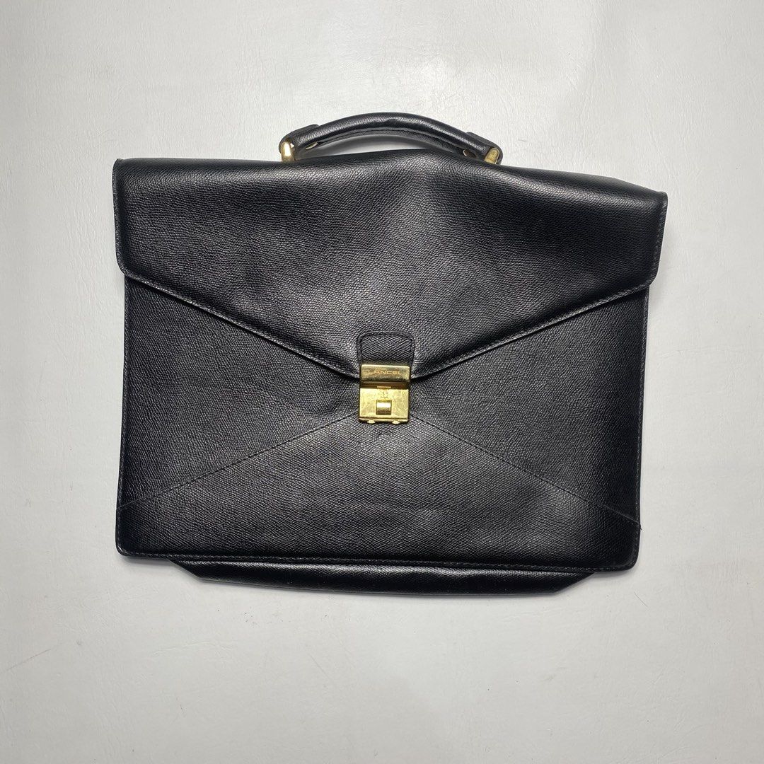LANCEL LEATHER BRIEFCASE (Category: Luxury Bags & Wallets) located in Manila. Submitted by valuable_rags (Listing ID 1463125779, Image 1). Description: LANCEL LEATHER BRIEFCASE CONDITION: EXCELLENT SIZE : MEDIUM DIMENSION : W15.5 x L12 ISSUE: NONE .