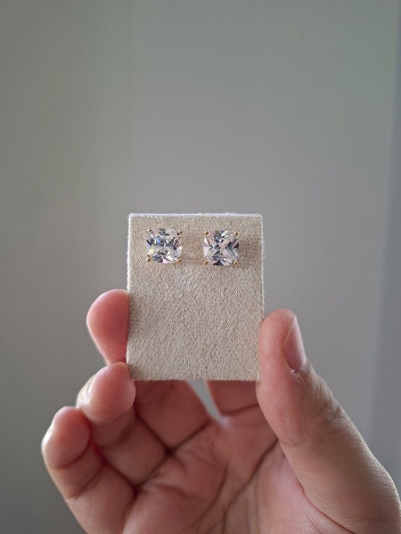 Large Sparkly Square Cut Stone Gold Stud Earrings (Category: Earrings) located in Dasmarinas. Submitted by danabrie22 (Listing ID 1463234283, Image 2). Description: very well-made, excellent crafstmanship 10/10 condition brand new stainless steel & white crystal-colored cubic zirconia stones made in Hongkong.