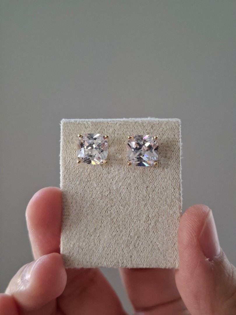 Large Sparkly Square Cut Stone Gold Stud Earrings (Category: Earrings) located in Dasmarinas. Submitted by danabrie22 (Listing ID 1463234283, Image 1). Description: very well-made, excellent crafstmanship 10/10 condition brand new stainless steel & white crystal-colored cubic zirconia stones made in Hongkong.