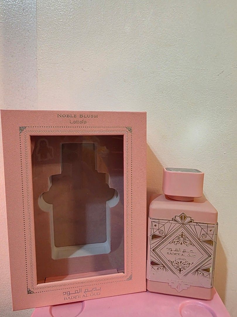 Lattafa Noble Blush Bade Al Oud Perfume (Category: Fragrance & Deodorants) located in Quezon City. Submitted by saiderr (Listing ID 1463239823, Image 1). Description: Almost New! Missing 5 sprays only!! ✅Lattafa Noble Blush Bade Al Oud Perfume ✅ Scent Profile: Sweet, powdery, almond, vanilla, musky, woody, nutty, and fruity accords ✅Packaging: Comes in its original pink box RFS: Decluttering. I prefer another perfume Notes: Seller to shoulder cou
