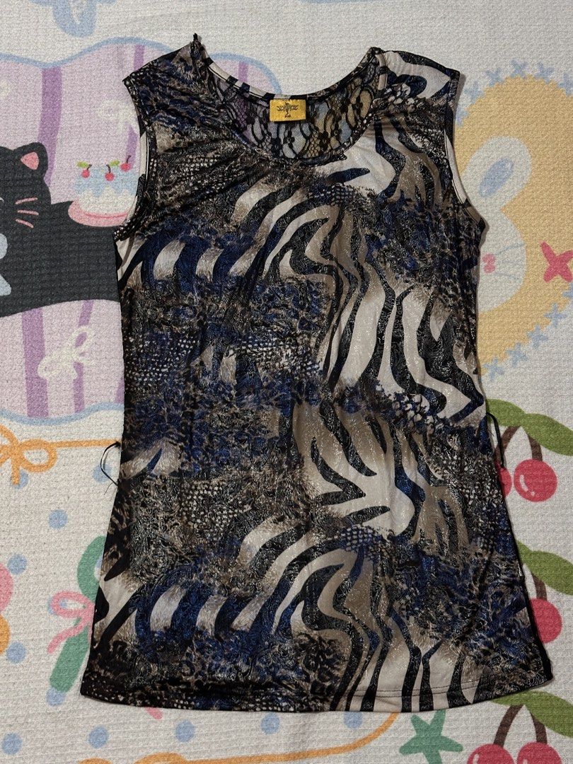 Leopard Tank Top with Lace Back (S) (Category: Sleeveless) located in Manila. Submitted by vintage_revo.ph (Listing ID 1463284268, Image 1). Description: .