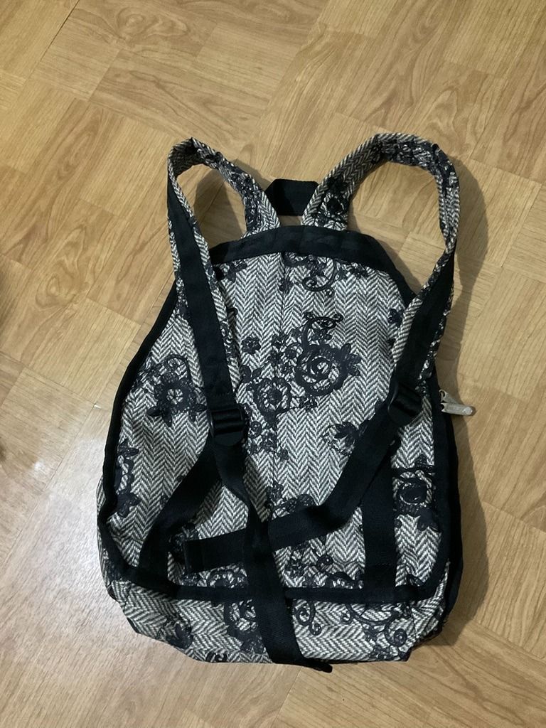 LeSportsac Backpack Floral Print (Category: Backpacks) located in Quezon City. Submitted by frugallove (Listing ID 1463162559, Image 3). Description: - Adorable LeSportsac backpack with a chic black and beige floral print. - Features two convenient zippered compartments on the front for easy access. - Adjustable straps ensure a comfortable fit for all-day wear. - Versatile design, ideal for everyday errands or your next travel adventure. - Approx
