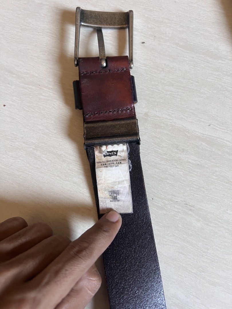 Levi's Leather Belt (Category: Belts) located in Zamboanga. Submitted by safe.haimer (Listing ID 1463230519, Image 3). Description: - Genuine Levi's Belt - 100% Full Grain Bovine Leather - Classic Buckle Design - Available in Dark Brown and Black - Perfect for Everyday Wear - Shows some signs of use, but remains sturdy and durable.