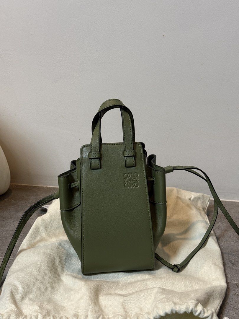 Loewe mini hammock drawstring in calfskin leather (Category: Cross-body Bags) located in Bacoor. Submitted by patcgonzaga (Listing ID 1463165995, Image 1). Description: Purchased for 80k in Japan Lightly used only. Comes with dustbag and tag..
