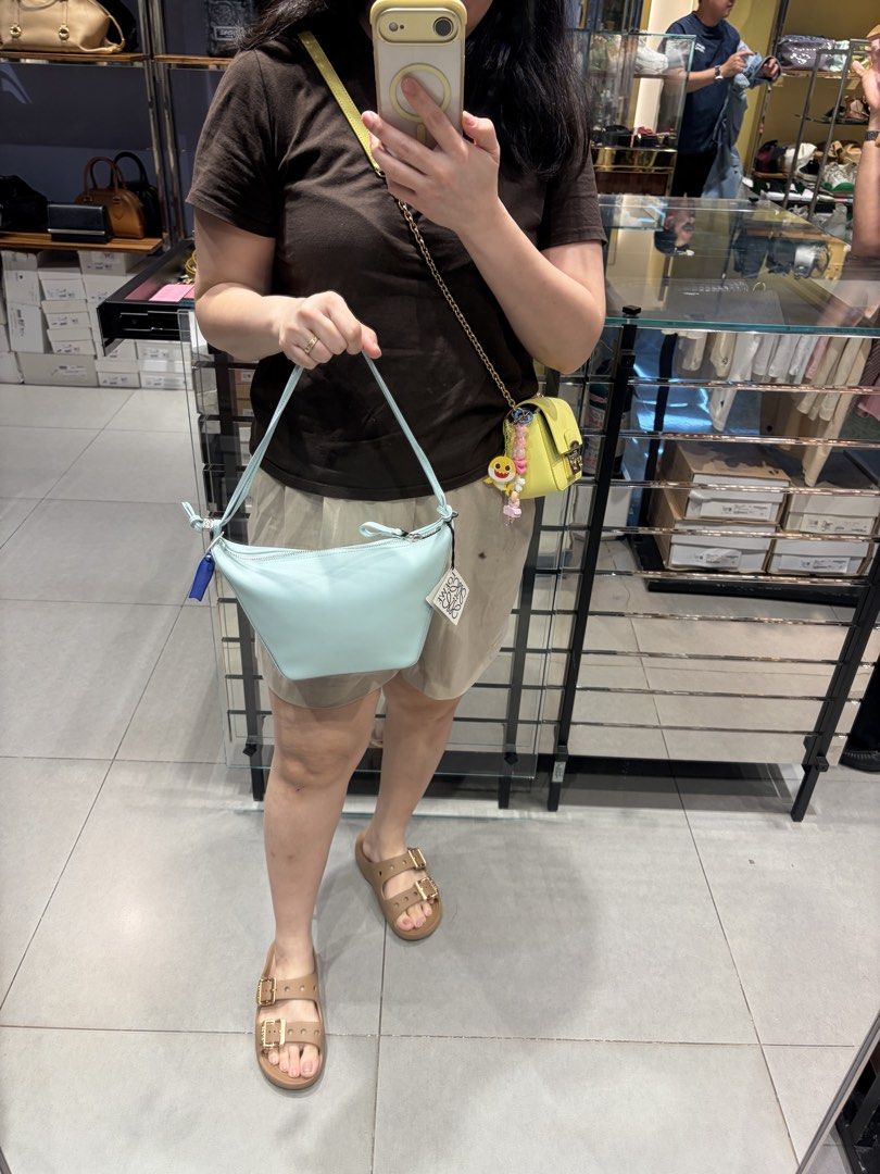 Loewe Mini Hammok Tote Bag Light Blue Leather (Category: Luxury Bags & Wallets) located in Cavite. Submitted by tripleKgels (Listing ID 1463174081, Image 2). Description: - Brand: Loewe - Model: Hammok Mini Bag - Color: Light Blue - Material: Soft Leather - Closure: Zip - Strap: Long strap for crossbody or shoulder wear - Includes: Dust bag and carfs - Ideal for: Everyday use.
