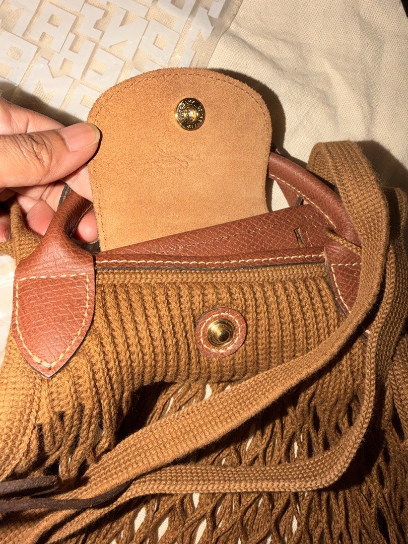 Longchamp Le Pliage Filet Tote Bag Brown (Category: Luxury Bags & Wallets) located in Las Pinas. Submitted by twiceloved24 (Listing ID 1463263182, Image 3). Description: Bought for almost ₱9,000 Used once only - will pass as brand new! with tags + ziplock Selling for ₱7,000.