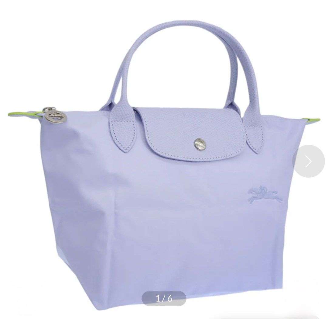 Longchamp Le Pliage Top Handle Bag XS (Category: Luxury Bags & Wallets) located in Manila. Submitted by bl0ss0ms711 (Listing ID 1463299916, Image 1). Description: - Purchased in Switzerland - Comes with extra strap (not Longchamp) as this is only a short handle version - Very rare color usually available only in Europe and in Retail store. - It’s close to Periwinkle or Light Blue. Very subtle blue/lilac - Lightweight and foldable nylon bag - Styl