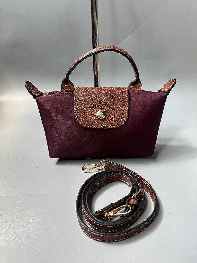 Longchamp maroon (Category: Cross-body Bags) located in San Jacinto. Submitted by kellysthrift_ (Listing ID 1463325252, Image 1). Description: Longchamp maroon mini.